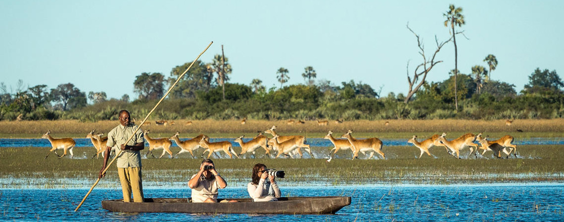 Boat riding at Okavango Delta Botwana Safari Holiday